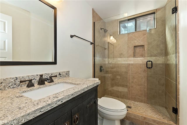 41935 Switzerland Dr Unit 100, Big Bear Lake, CA 92315 - bathroom with toilet, a stall shower, and vanity