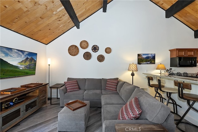 41935 Switzerland Dr Unit 100, Big Bear Lake, CA 92315 - living area with beamed ceiling, high vaulted ceiling, wooden ceiling, and wood finished floors