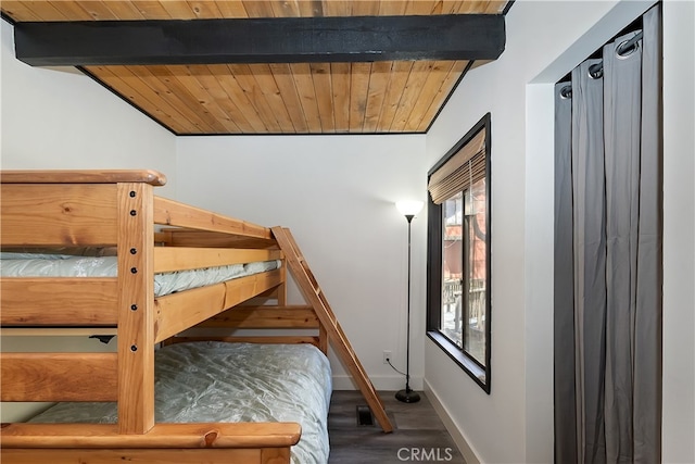 41935 Switzerland Dr Unit 100, Big Bear Lake, CA 92315 - bedroom featuring wooden ceiling, wood finished floors, baseboards, and vaulted ceiling with beams