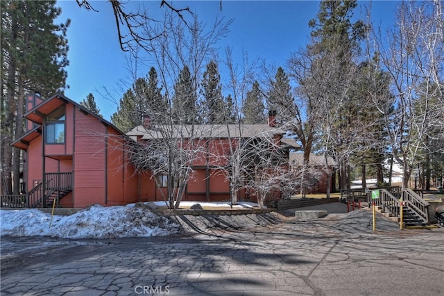 41935 Switzerland Dr Unit 100, Big Bear Lake, CA 92315 - view of front of home featuring a chimney