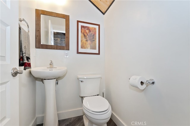 41935 Switzerland Dr Unit 100, Big Bear Lake, CA 92315 - bathroom featuring toilet, wood finished floors, and baseboards