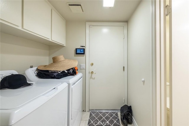 4054 Corte Cima, Thousand Oaks, CA 91360 - laundry area featuring washing machine and clothes dryer, cabinet space, and tile patterned floors