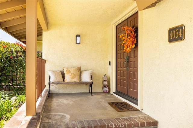 4054 Corte Cima, Thousand Oaks, CA 91360 - doorway to property with stucco siding and covered porch