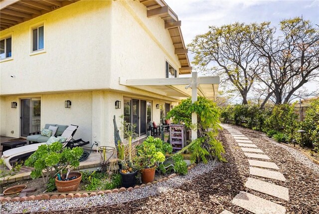 4054 Corte Cima, Thousand Oaks, CA 91360 - back of house featuring stucco siding, a patio, and fence