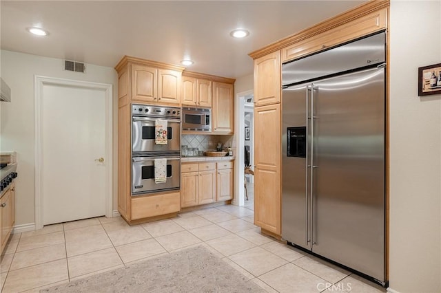 4054 Corte Cima, Thousand Oaks, CA 91360 - kitchen with built in appliances, light brown cabinets, light tile patterned floors, and recessed lighting