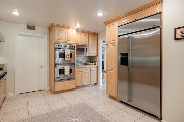 4054 Corte Cima, Thousand Oaks, CA 91360 - kitchen with built in appliances, light brown cabinets, light tile patterned floors, and recessed lighting