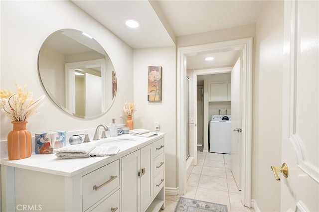 4054 Corte Cima, Thousand Oaks, CA 91360 - bathroom with washer / clothes dryer, a stall shower, vanity, tile patterned floors, and recessed lighting