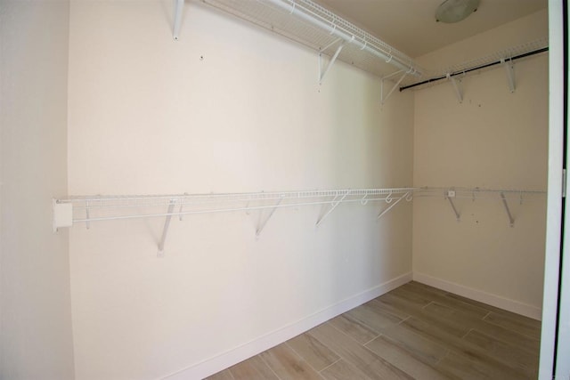 2821 Macdonald St, Oceanside, CA 92054 - walk in closet featuring wood finished floors
