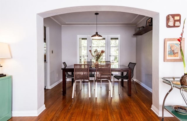 4640 Max Dr, San Diego, CA 92115 - dining area featuring arched walkways, dark wood-type flooring, and ornamental molding