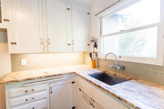 4640 Max Dr, San Diego, CA 92115 - kitchen with tasteful backsplash, white cabinetry, and light stone counters