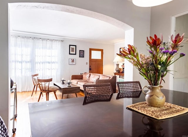 4640 Max Dr, San Diego, CA 92115 - living area featuring arched walkways, crown molding, and wood finished floors