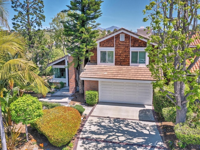 27275 Comba, Mission Viejo, CA 92692 - view of front of house with concrete driveway and an attached garage