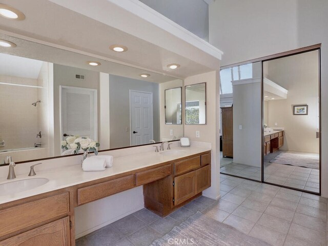 27275 Comba, Mission Viejo, CA 92692 - bathroom with double vanity, tile patterned floors, shower / bathtub combination, and recessed lighting