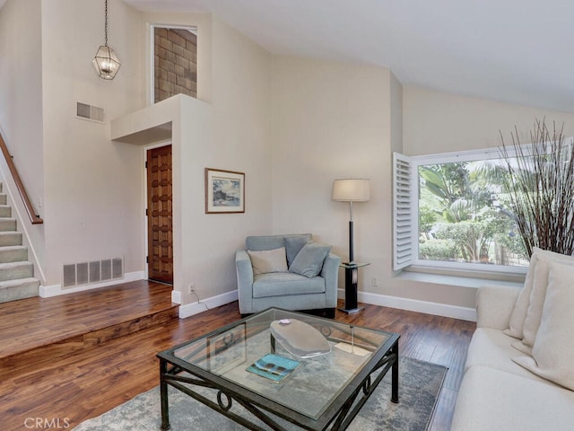 27275 Comba, Mission Viejo, CA 92692 - living area with high vaulted ceiling, stairs, wood finished floors, and baseboards