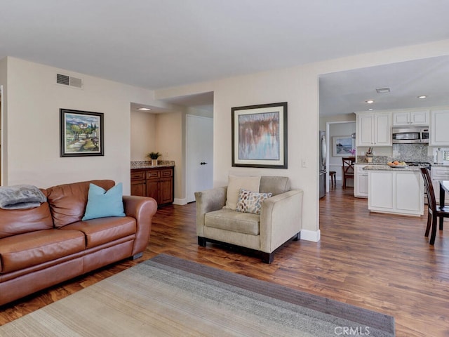 27275 Comba, Mission Viejo, CA 92692 - living room featuring dark wood finished floors, baseboards, and recessed lighting