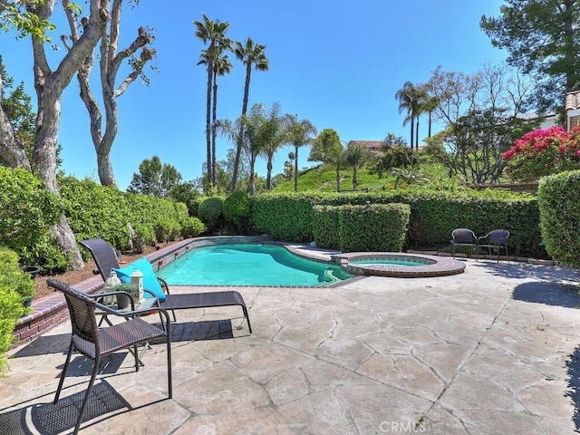 27275 Comba, Mission Viejo, CA 92692 - view of swimming pool with a patio area and a pool with connected hot tub