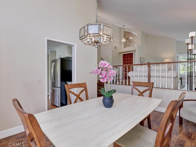 27275 Comba, Mission Viejo, CA 92692 - dining space with a chandelier, baseboards, wood finished floors, and a high ceiling