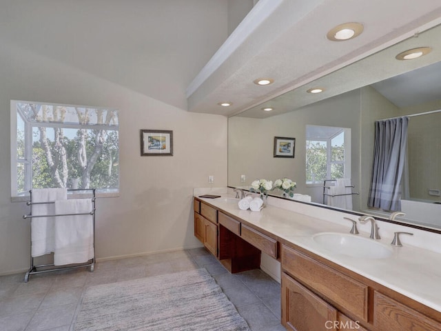 27275 Comba, Mission Viejo, CA 92692 - full bathroom with double vanity, lofted ceiling, a shower with shower curtain, recessed lighting, and tile patterned flooring