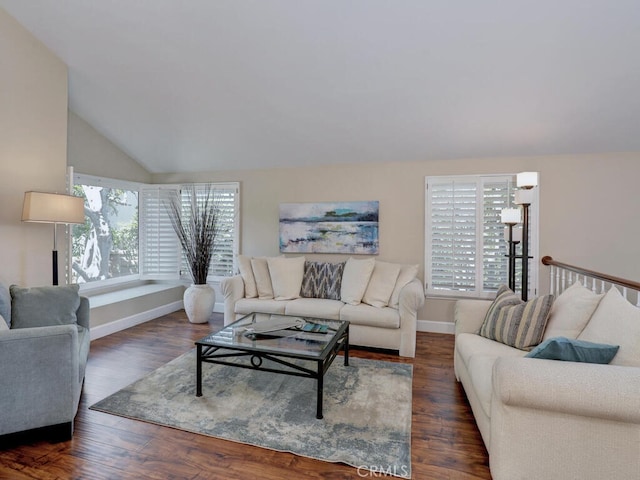 27275 Comba, Mission Viejo, CA 92692 - living room featuring healthy amount of natural light, vaulted ceiling, wood finished floors, and baseboards