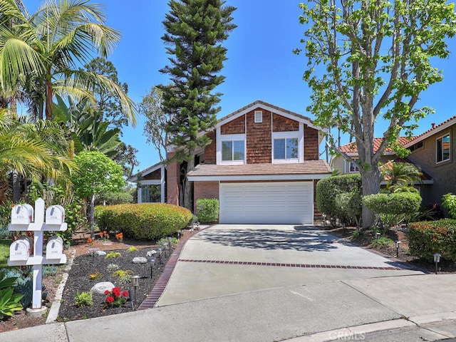27275 Comba, Mission Viejo, CA 92692 - view of front facade featuring driveway and a garage