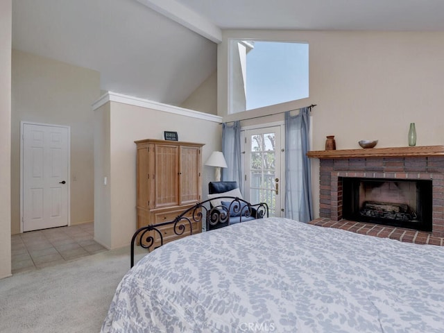 carpeted bedroom with beam ceiling, access to exterior, high vaulted ceiling, and a brick fireplace