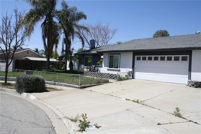 6320 Amberwood Dr, Rancho Cucamonga, CA 91701 - single story home featuring concrete driveway, stucco siding, a chimney, an attached garage, and a fenced front yard