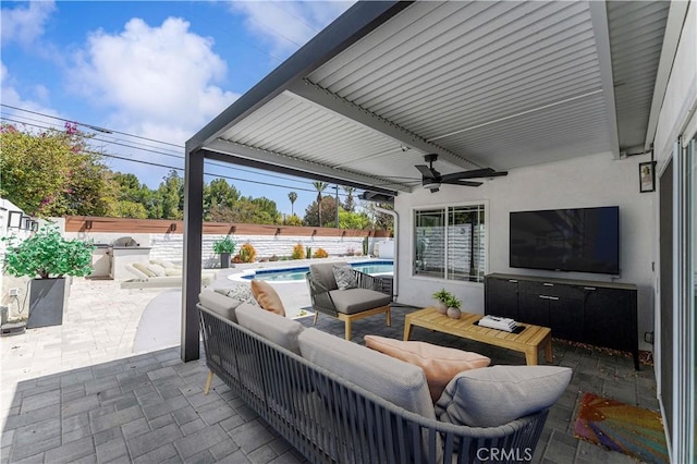 view of patio featuring a fenced backyard, an outdoor living space, a ceiling fan, and a fenced in pool
