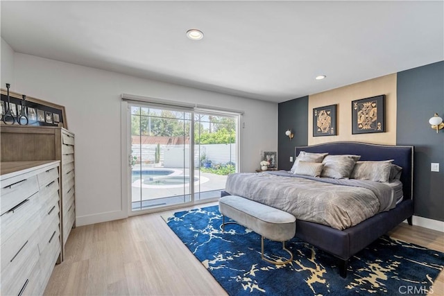 bedroom featuring recessed lighting, light wood-style flooring, access to outside, and baseboards