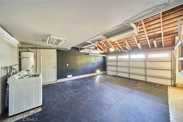 19910 Cantara St, Winnetka, CA 91306 - garage featuring water heater, a garage door opener, and washer and clothes dryer
