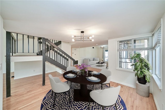 19910 Cantara St, Winnetka, CA 91306 - interior space with baseboards, a chandelier, wood finished floors, and stairway