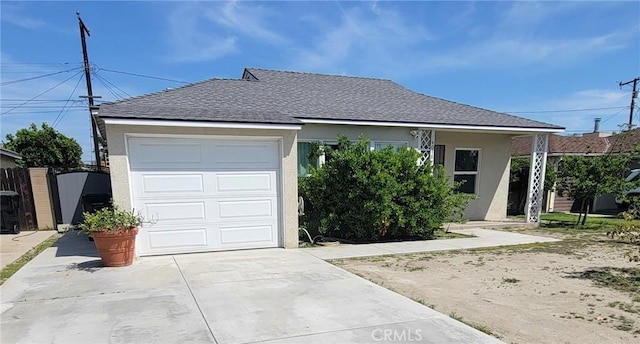 14018 Gridley Rd, Norwalk, CA 90650 - ranch-style home with a shingled roof, driveway, and stucco siding