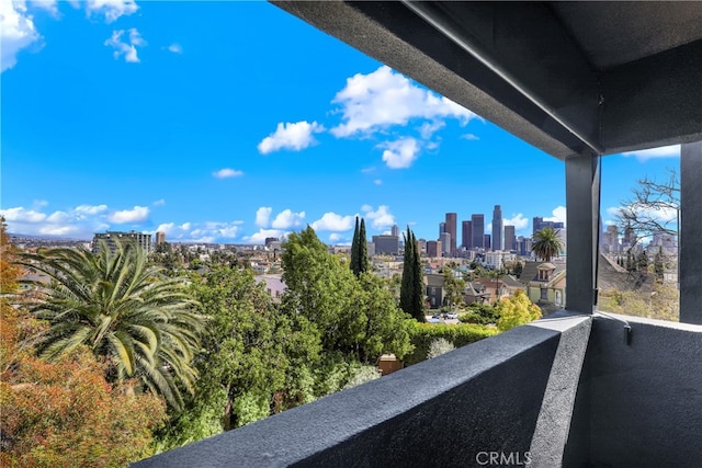 balcony featuring a view of city