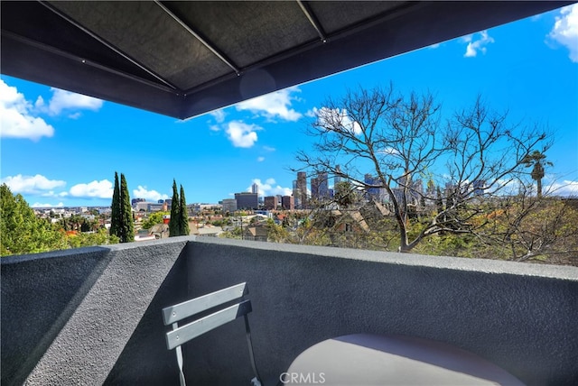 balcony featuring a city view
