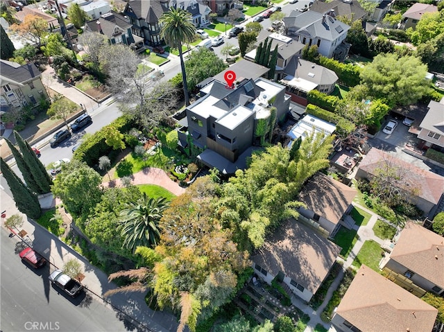 birds eye view of property with a residential view