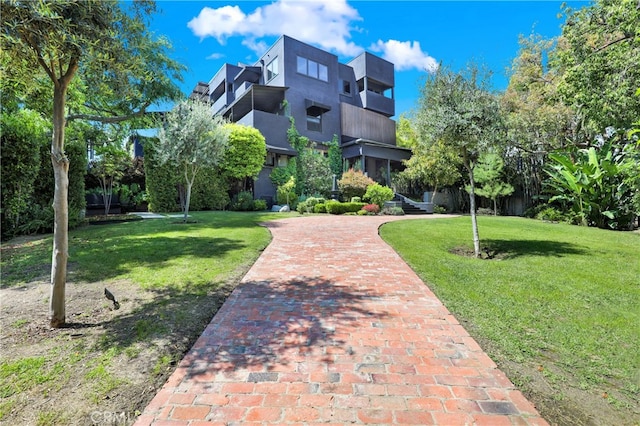 801 E Edgeware Rd, Los Angeles, CA 90026 - view of community featuring a yard and decorative driveway