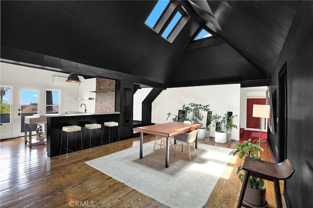 801 E Edgeware Rd, Los Angeles, CA 90026 - office area featuring high vaulted ceiling, wood finished floors, and a sink