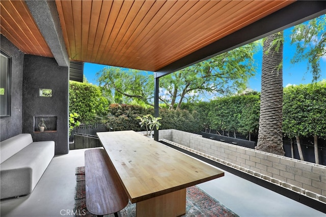 view of patio / terrace with a fenced backyard and an outdoor living space
