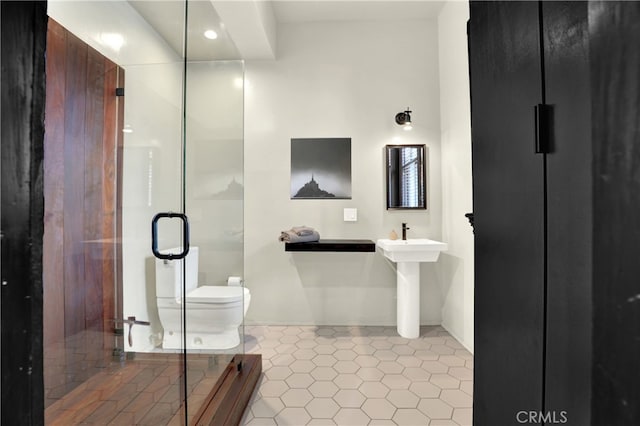 801 E Edgeware Rd, Los Angeles, CA 90026 - full bath featuring toilet, a stall shower, tile patterned floors, and recessed lighting
