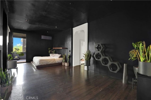 801 E Edgeware Rd, Los Angeles, CA 90026 - bedroom with wood finished floors and arched walkways