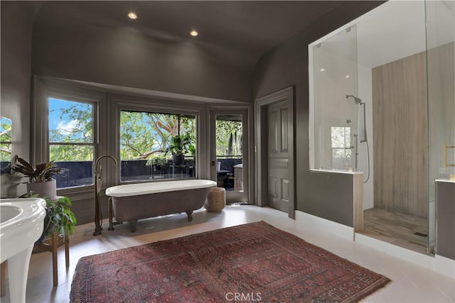 801 E Edgeware Rd, Los Angeles, CA 90026 - bathroom with walk in shower, a soaking tub, and recessed lighting