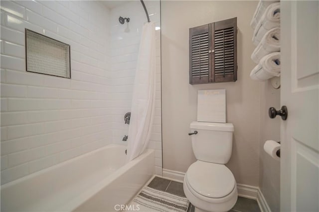 1345 Cabrillo Park Dr Unit J02, Santa Ana, CA 92701 - full bath featuring baseboards, tile patterned flooring, toilet, and shower / tub combo