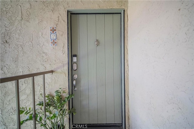 1345 Cabrillo Park Dr Unit J02, Santa Ana, CA 92701 - property entrance with stucco siding