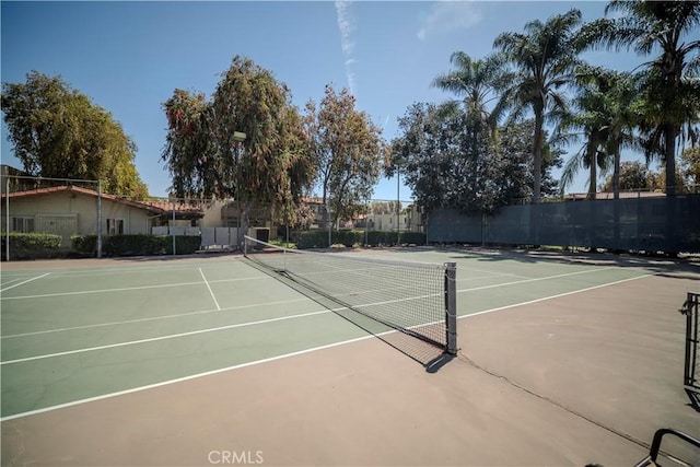 1345 Cabrillo Park Dr Unit J02, Santa Ana, CA 92701 - view of tennis court with fence and community basketball court