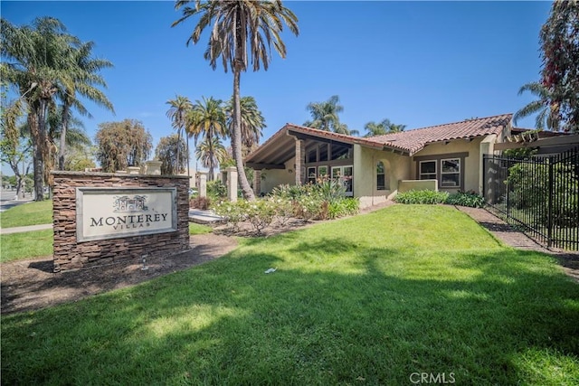 1345 Cabrillo Park Dr Unit J02, Santa Ana, CA 92701 - back of house featuring stucco siding and a tiled roof