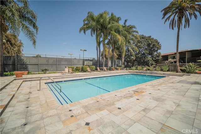 1345 Cabrillo Park Dr Unit J02, Santa Ana, CA 92701 - community pool with fence and a patio area