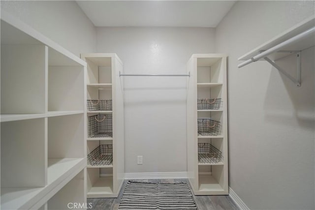 1345 Cabrillo Park Dr Unit J02, Santa Ana, CA 92701 - spacious closet featuring wood finished floors