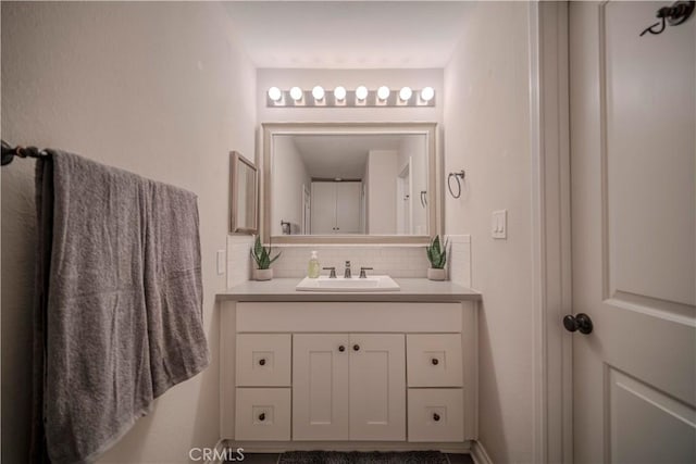 1345 Cabrillo Park Dr Unit J02, Santa Ana, CA 92701 - bathroom with tasteful backsplash and vanity