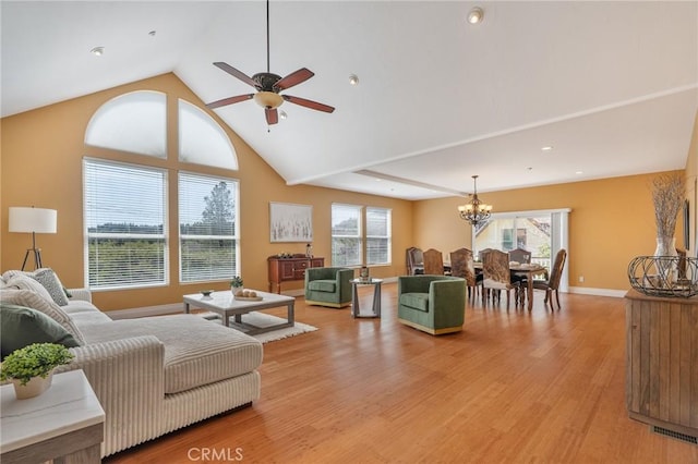 27732 N Bay Rd, Lake Arrowhead, CA 92352 - living area with a chandelier, plenty of natural light, ceiling fan, light wood finished floors, and high vaulted ceiling