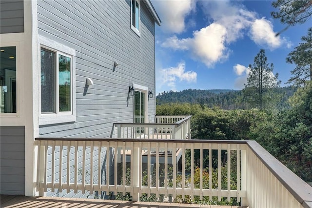 deck with a wooded view