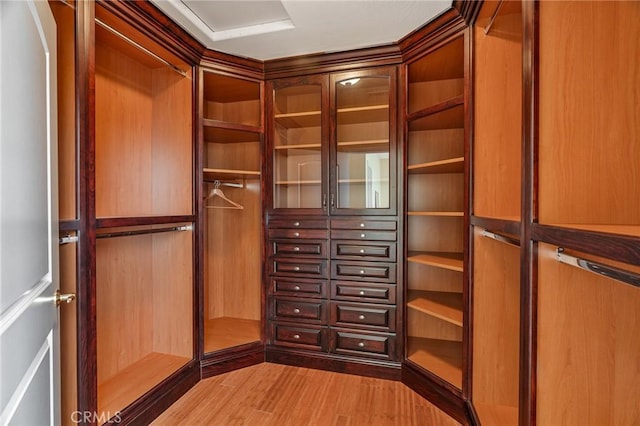27732 N Bay Rd, Lake Arrowhead, CA 92352 - walk in closet featuring wood finished floors